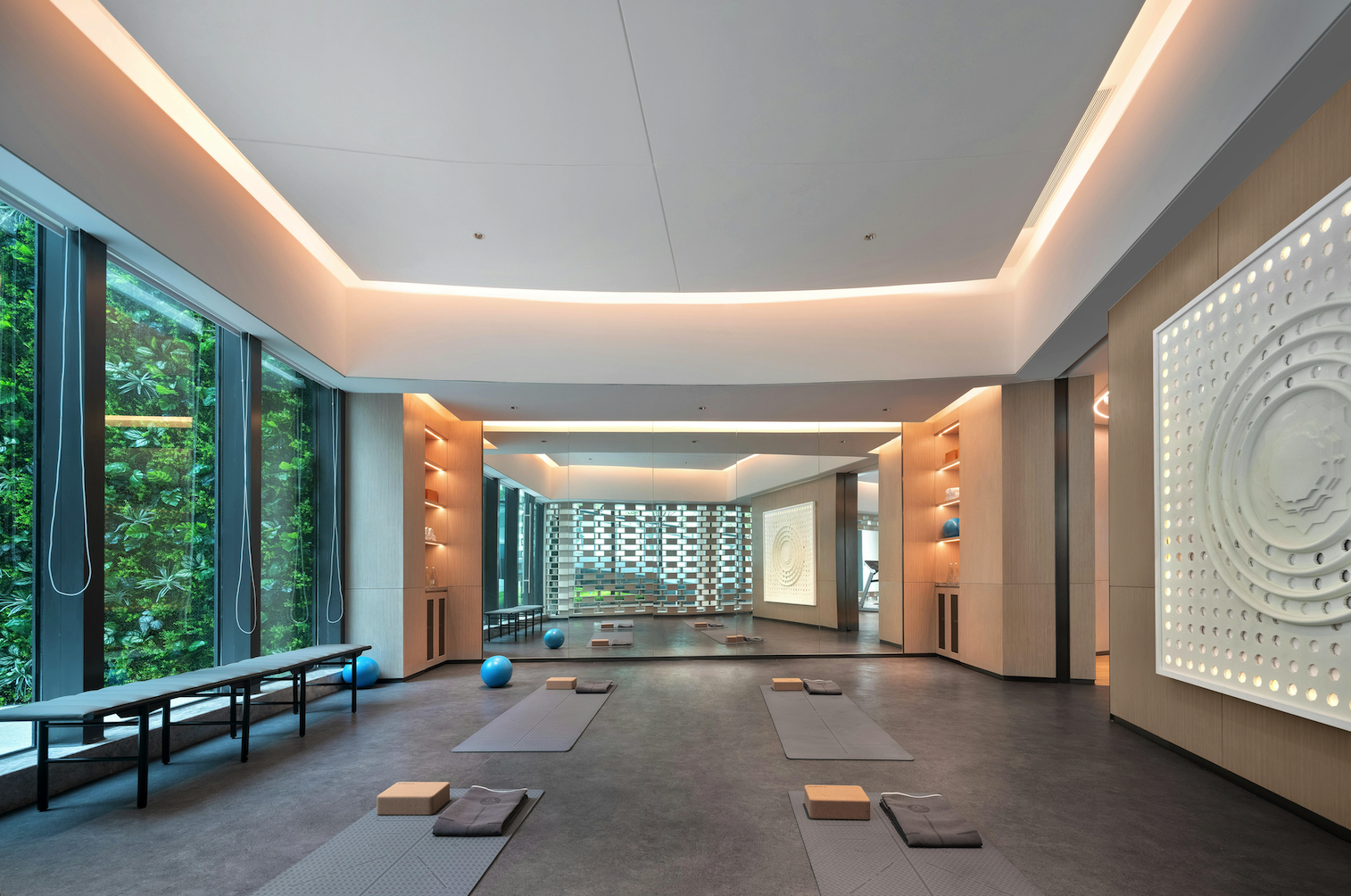 Yoga class in a full boutique fitness studio